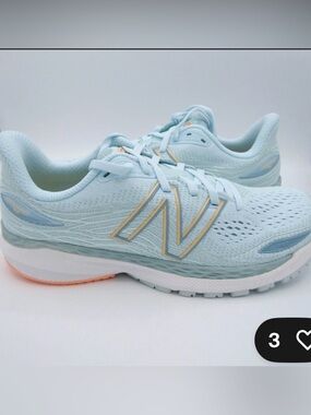 New Balance Women's Pale Blue Running Sneakers with Peach Accents
